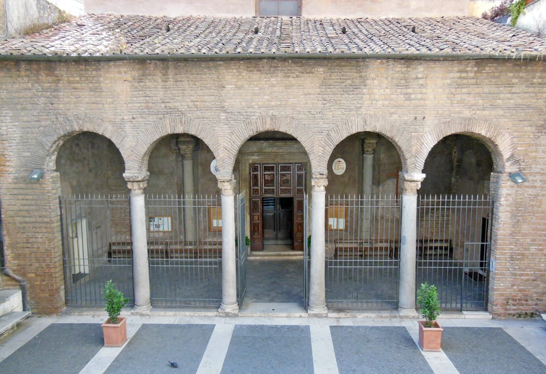 Portico and exterior facade of San Vitale on Via Nazionale in Rome.